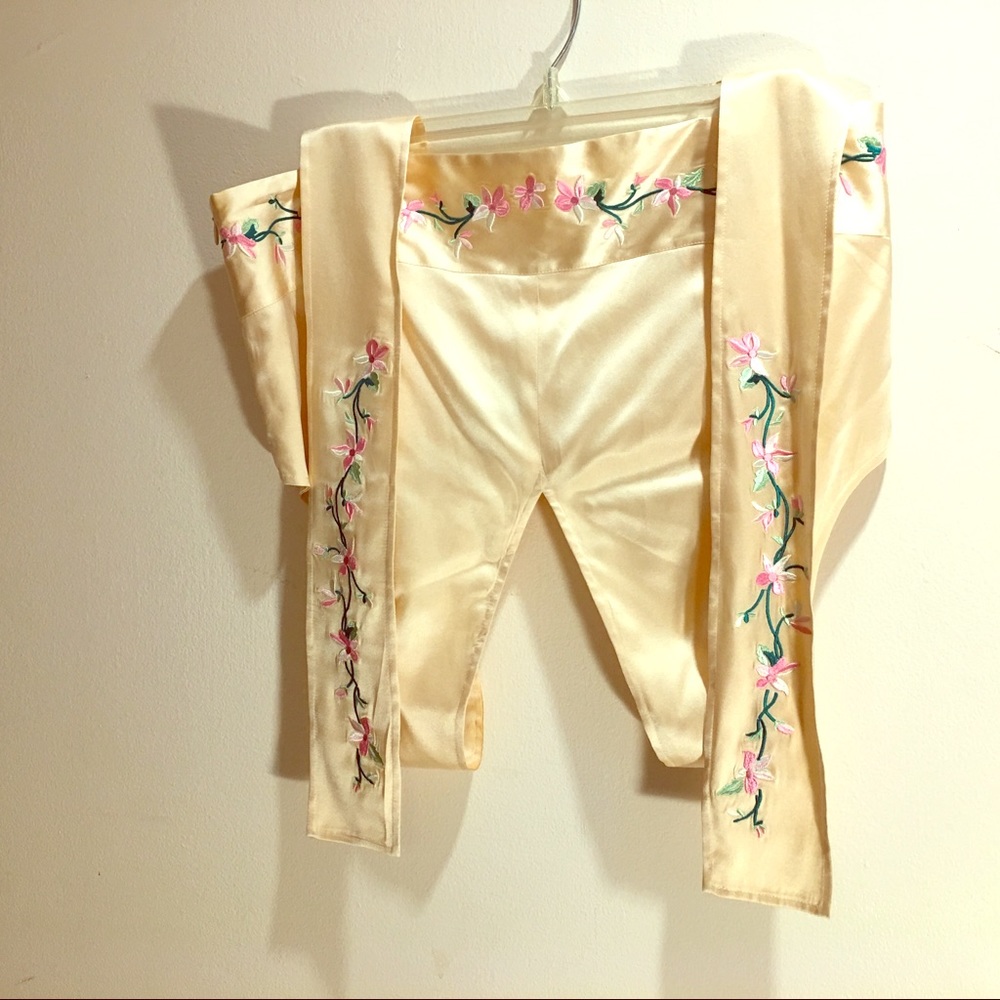 Elegantly cropped satin wraparound evening top